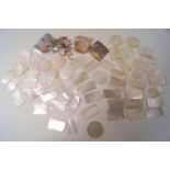 A small collection of mother of pearl gaming counters,