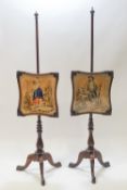 A pair of 19th century rosewood fire pole screens on tripod bases set with a Berlin wool work panel