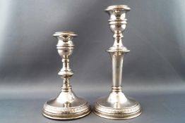 Two baluster form silver candlesticks with matching beaded decoration, stamped 925.