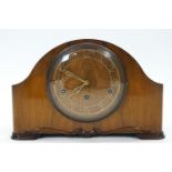 A Smiths walnut mantel clock with chiming movement, complete with key and pendulum,