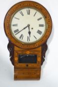 A Victorian drop dial wall clock of mixed wood and veneer, set a round Roman dial,