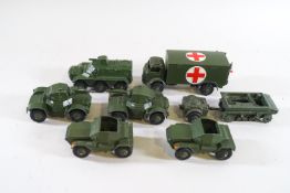 Dinky, two Scout cars No 673, two armoured cars No 670, a military ambulance No 626,