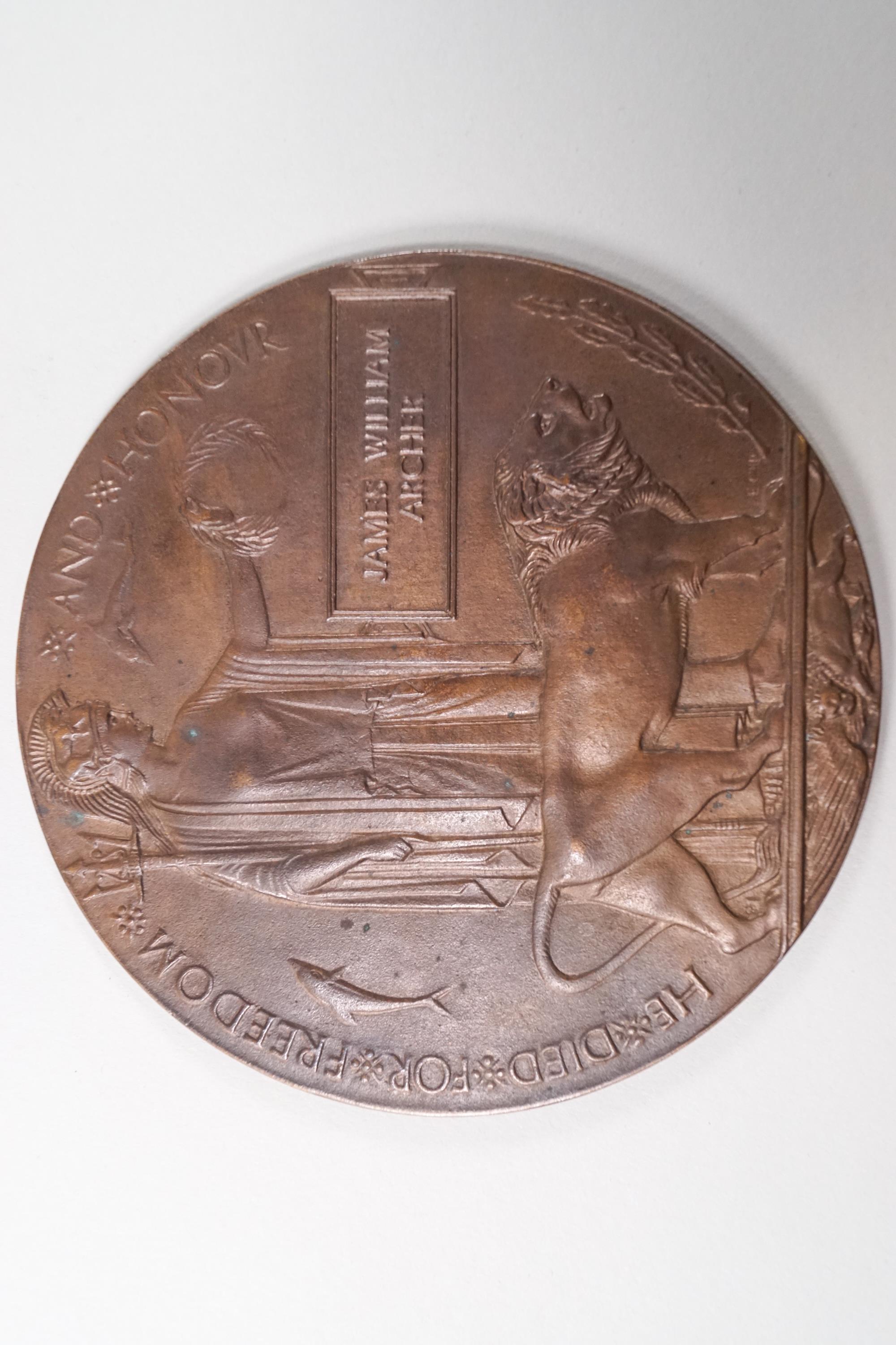 A WWI Death penny plaque,