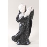 A carved hard stone figure of an oriental courtesan dancing with a fan,