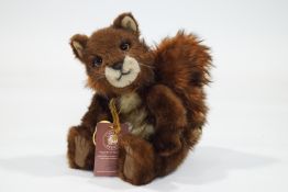 A Charlie Bear squirrel, 'Colonel McNutty', 32 cm high, with tags, limited edition No 1222 of 2000,