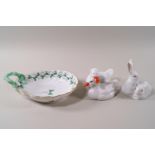 A Herend leaf form dish and two figure groups of ducks and rabbits, the dish 17cm,