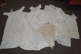 Various early 20th century christening gowns and other linen