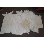 Various early 20th century christening gowns and other linen