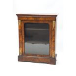 A Victorian walnut pier cabinet with gilt mounts,