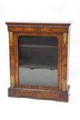 A Victorian walnut pier cabinet with gilt mounts,