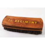An Army boot brush with brass 24th Regiment inlay