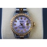 A ladies Rolex Oyster Perpetual with mother of pearl diamond dial,