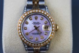 A ladies Rolex Oyster Perpetual with mother of pearl diamond dial,