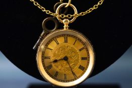 A 14ct gold open faced pocket watch with key wound movement and engraved floral case.
