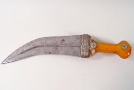 An Omani Jambala dagger with a horn and gilt handle