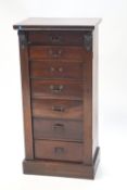A late Victorian mahogany Wellington chest with seven drawers.