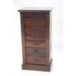 A late Victorian mahogany Wellington chest with seven drawers.