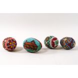 Four Romanian decorative beadwork eggs,