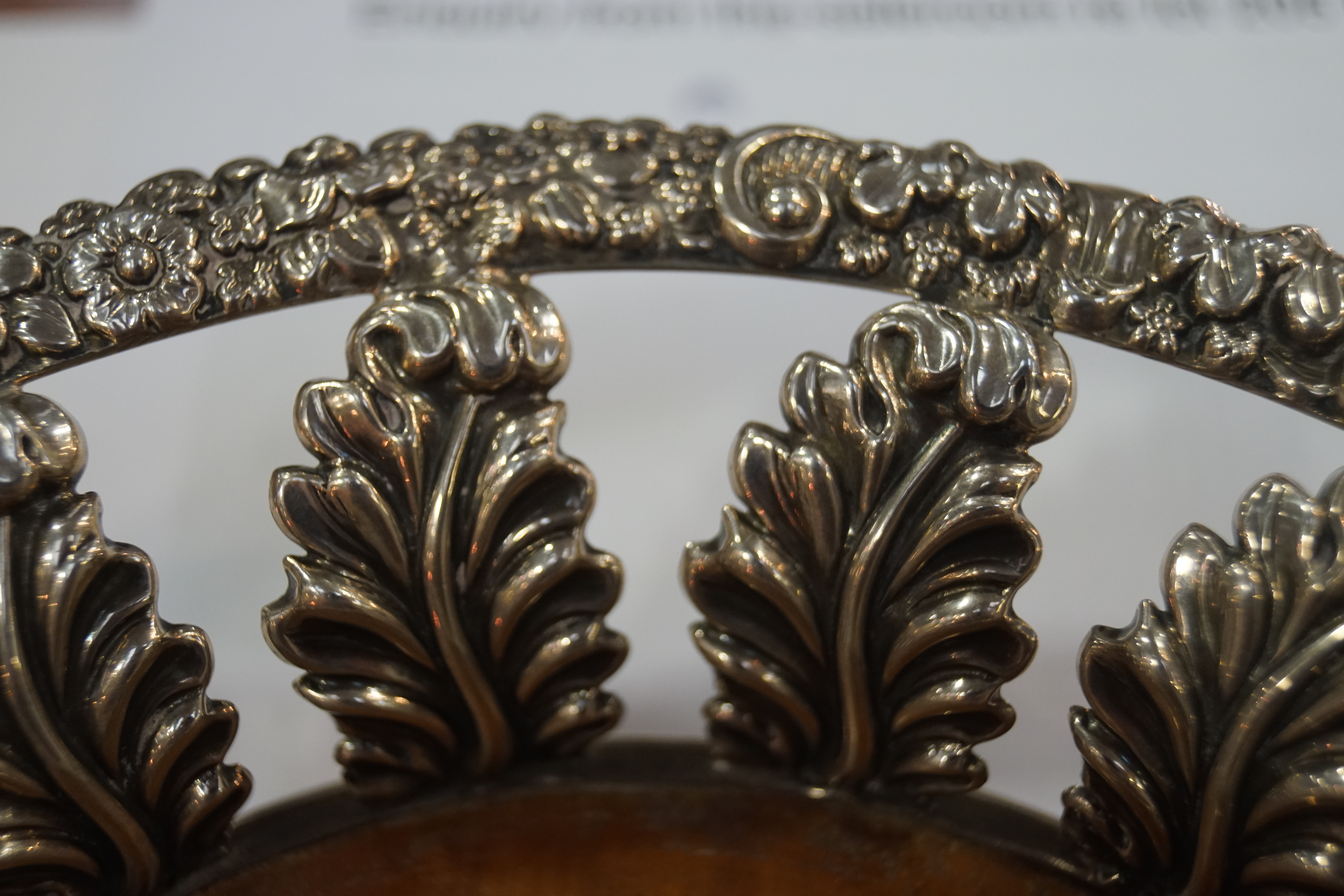 A pair of George III silver coasters with cast flower head and scrolling foliate rims supported by - Image 3 of 6