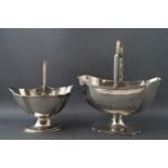 A silver shaped octagonal swing handled sugar basket with semi fluted decoration,