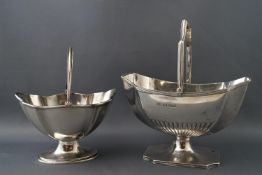 A silver shaped octagonal swing handled sugar basket with semi fluted decoration,