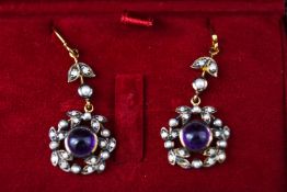 A 9ct and silver gilt pair of drop earrings.