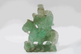 A Chinese carved jade figure on horseback,