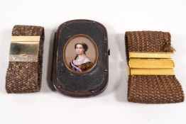 Two natural hair bracelets and a ladies leather purse with Images of Napoleon III and Empress