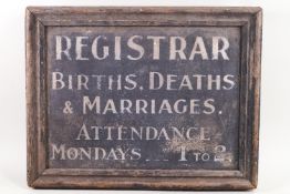 A wooden Registrar sign,