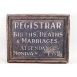 A wooden Registrar sign,