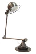 A French cast metal angle poise lamp