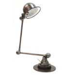 A French cast metal angle poise lamp