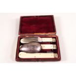 An early 20th century Officer's travelling Campaign knife, fork and spoon set,