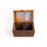 A mahogany rectangular form two compartment tea caddy, the top and front inlaid with shell motifs,