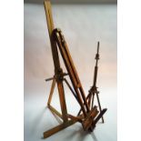 From The Studio of Ron Olley, Three wooden studio easels, 102, 158 and 184cm,