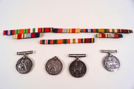 Four WWI George V medals,