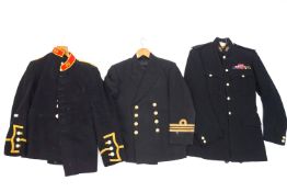 Three Military coats, comprising of one naval, and two Army,