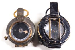 A WWII military issue compass, stamped T G Colt, London,