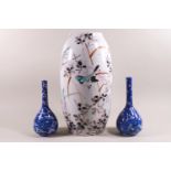 A pair of Chinese porcelain vases with bird decoration,