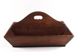 An early 19th century oak knife tray,