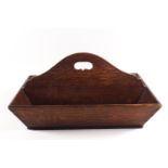 An early 19th century oak knife tray,