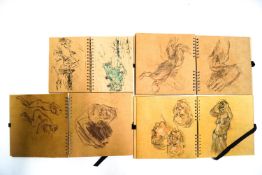 From The Studio of Ron Olley, A box of assorted sketch books.