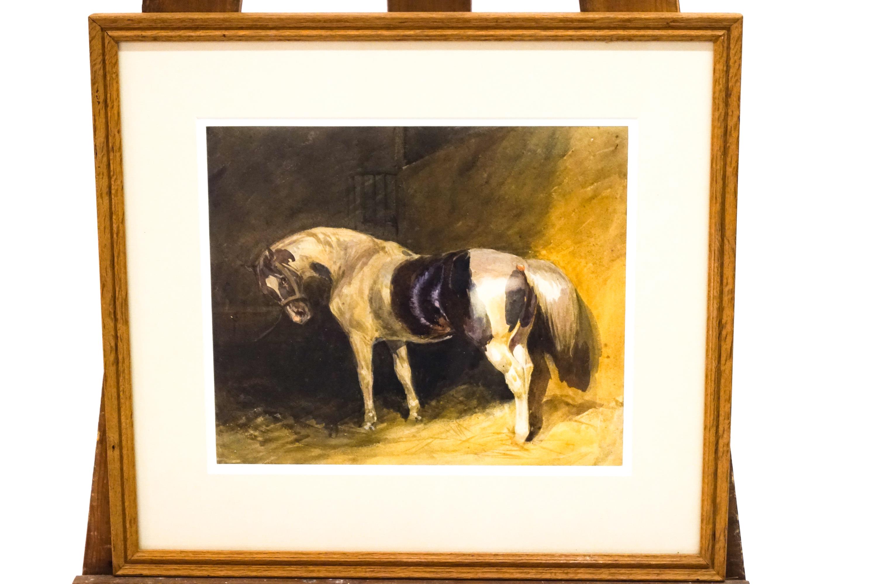 Attributed to Frederick Taylor, A piebald pony in a stable, watercolour.