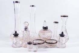 Four silver mounted glass vases, two silver mounted scent bottles and stoppers,