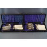 A set of six plated fish knives and forks,