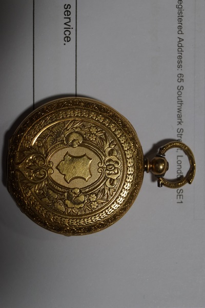 An open face engraved case pocket watch, key wound movement (key supplied). Case stamped 18K. - Image 2 of 2
