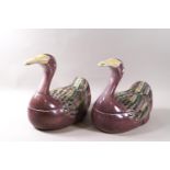 A pair of Chinese porcelain tureens and covers in the form of a duck, painted in coloured enamels,