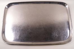 A large Keswick tray in steel, of rectangular form with fold over rim,