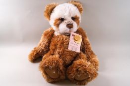 A Charlie bear, 'Hot Cross Bun', 45cm high, with tags, limited edition Number 2139 of 4000,