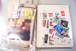 A box of mixed World stamps and First Day covers